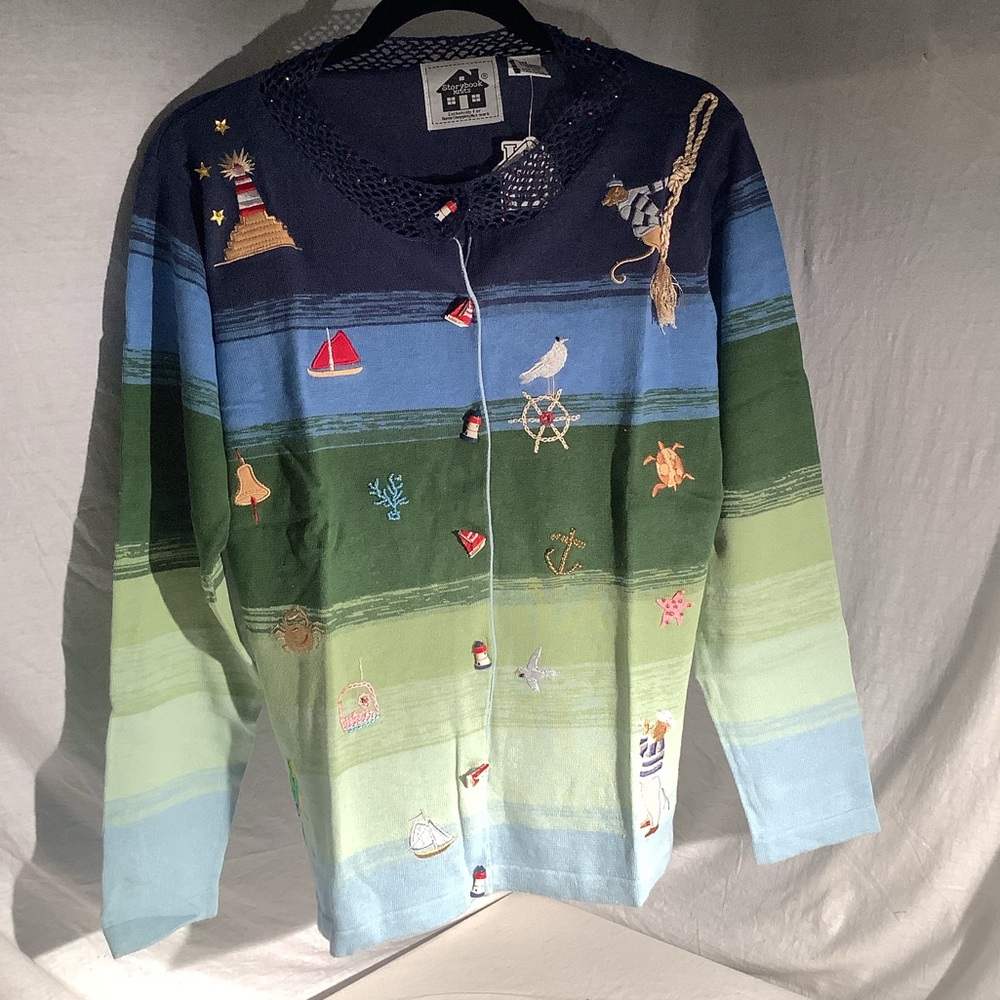 Storybook knit sweater titled “Nautical Journey “